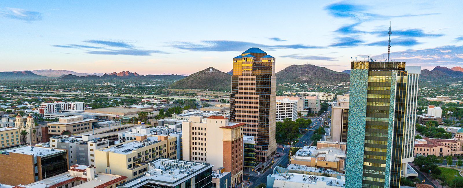 Aerial view of a downtown high-rise district at dusk
