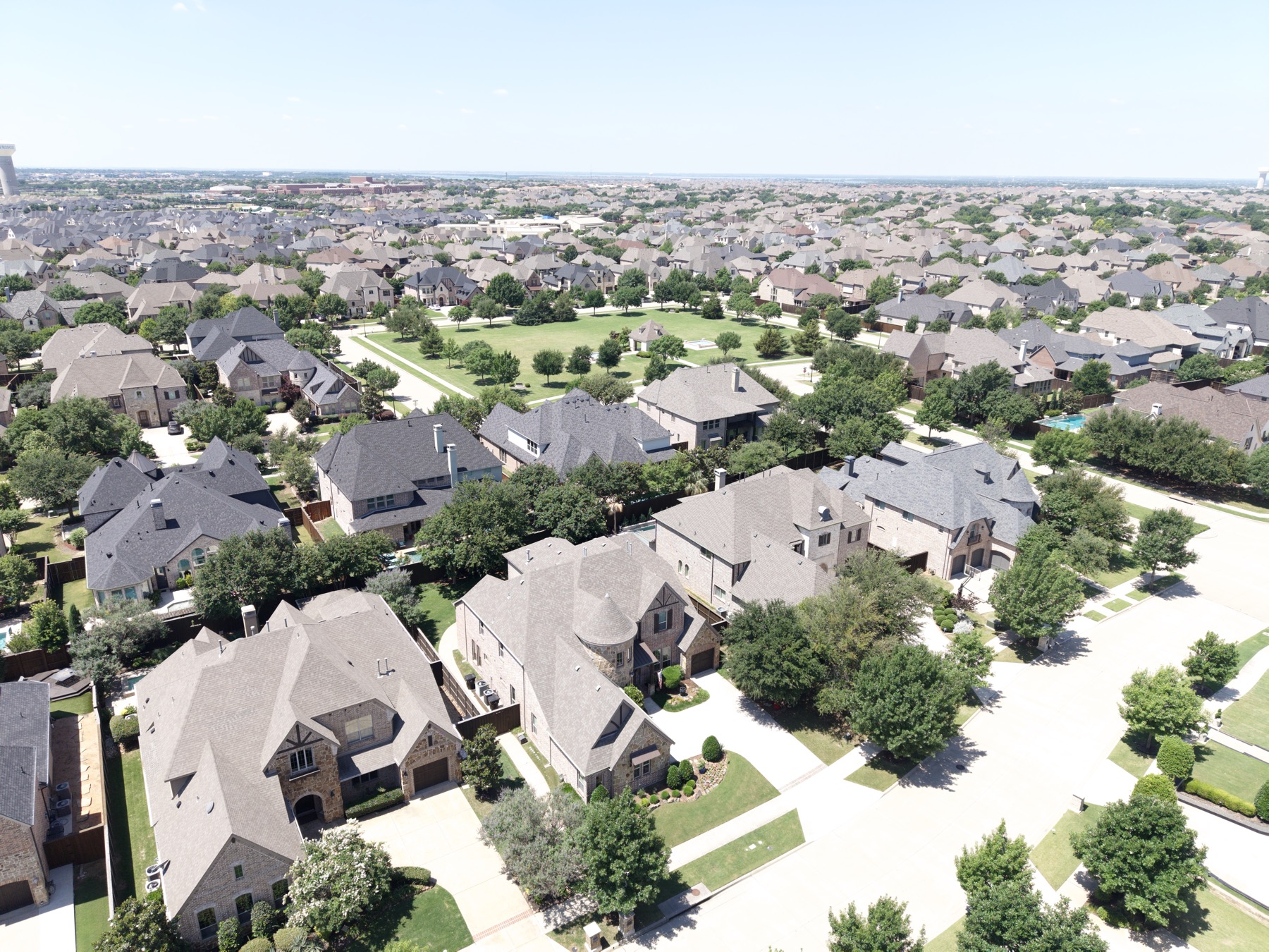 Aerial real estate drone photo of a luxury neighborhood in Frisco, Dallas–Fort Worth