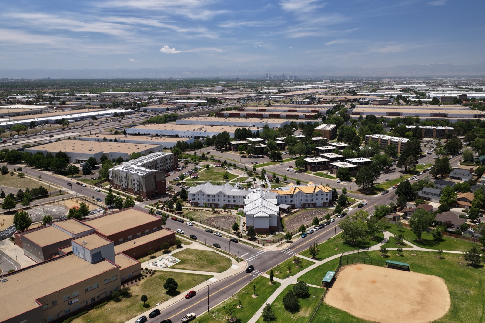 denver metro aerial real estate drone photography with mountain backdrop