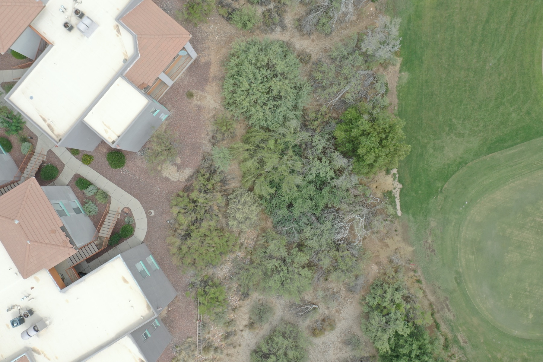 Aerial view of a large commercial flat roof during drone inspection
