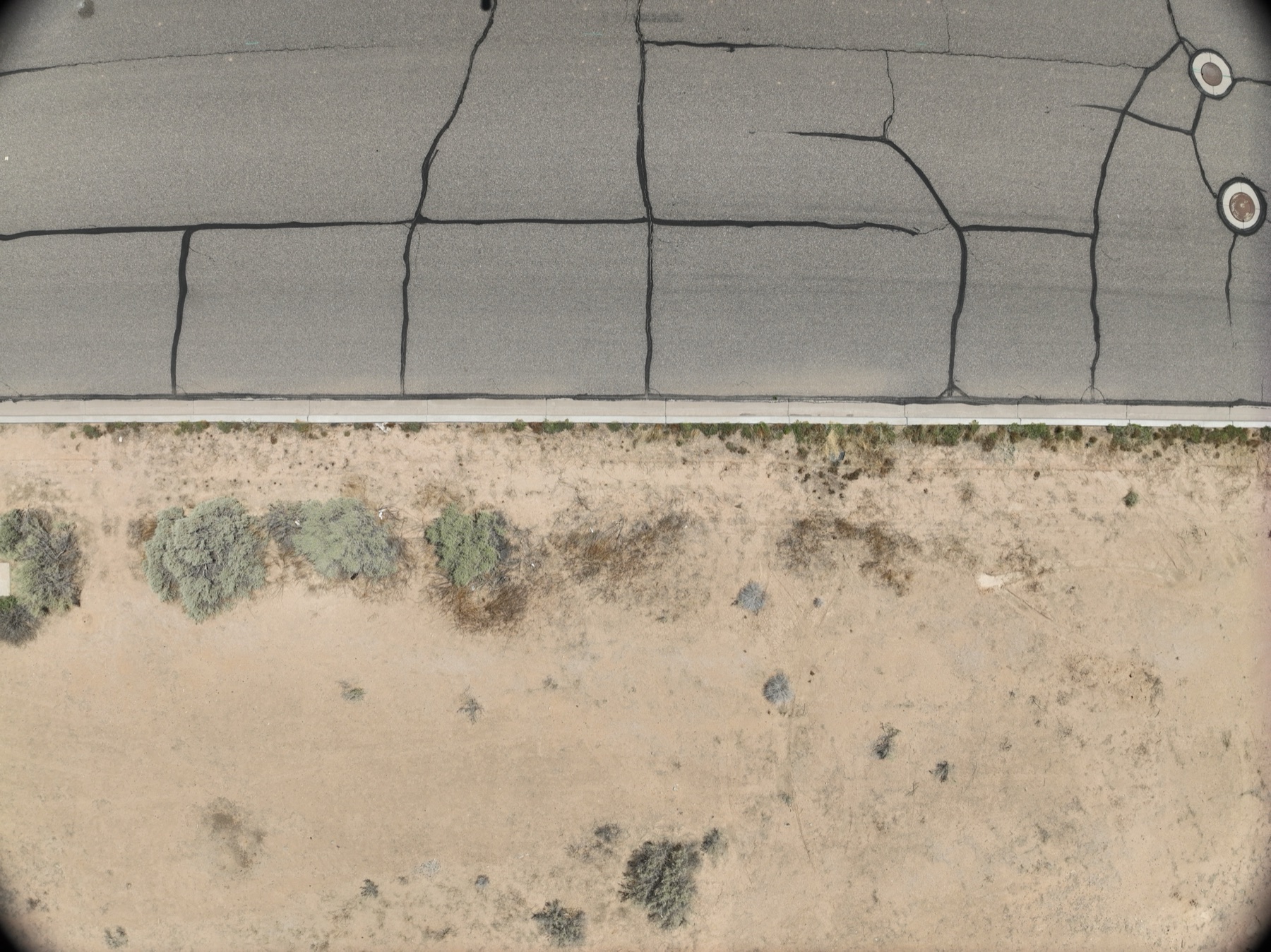 Aerial view of site grading and earthwork on a desert construction project