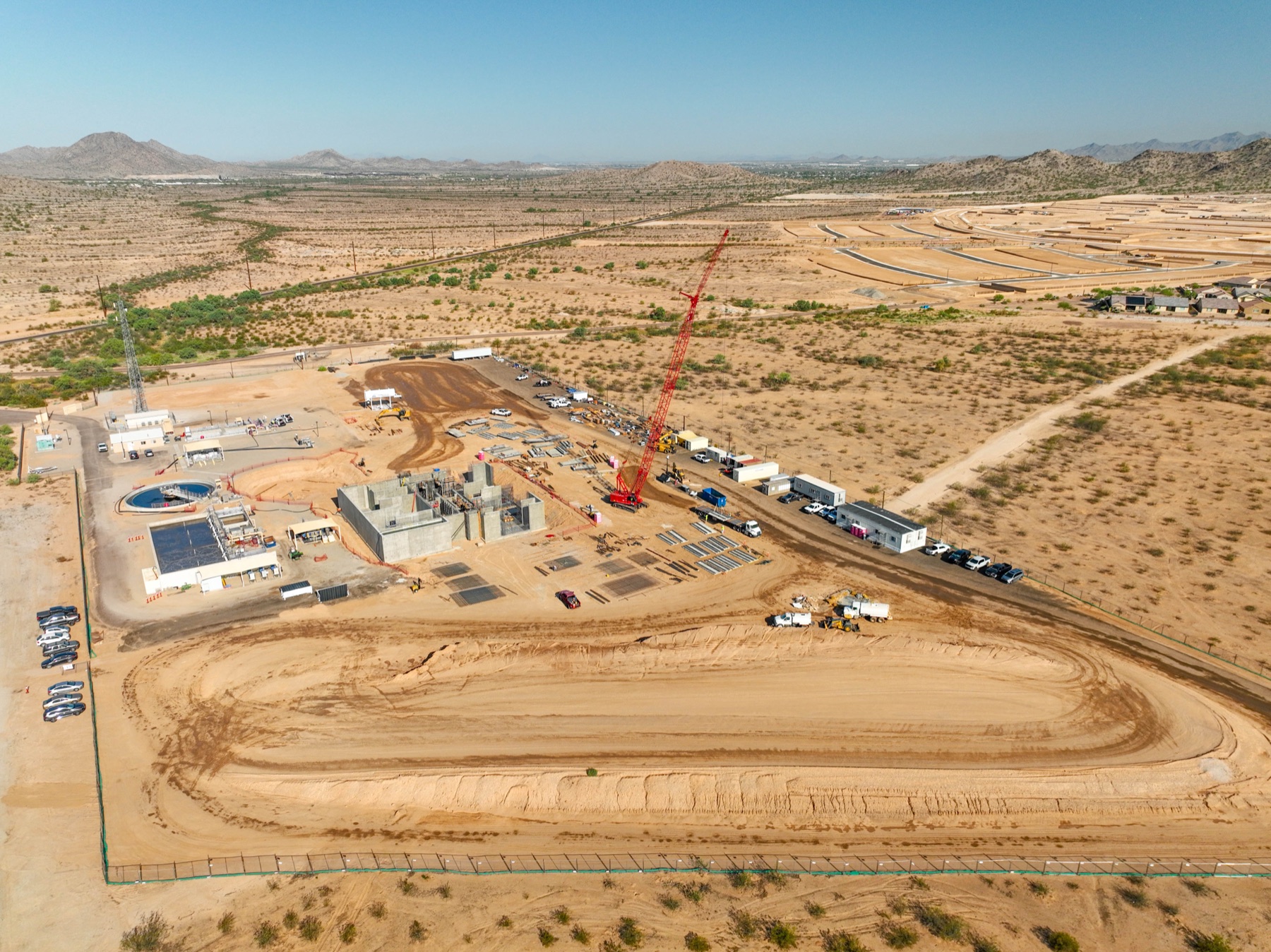 Aerial progress view of a commercial construction site in the desert Southwest