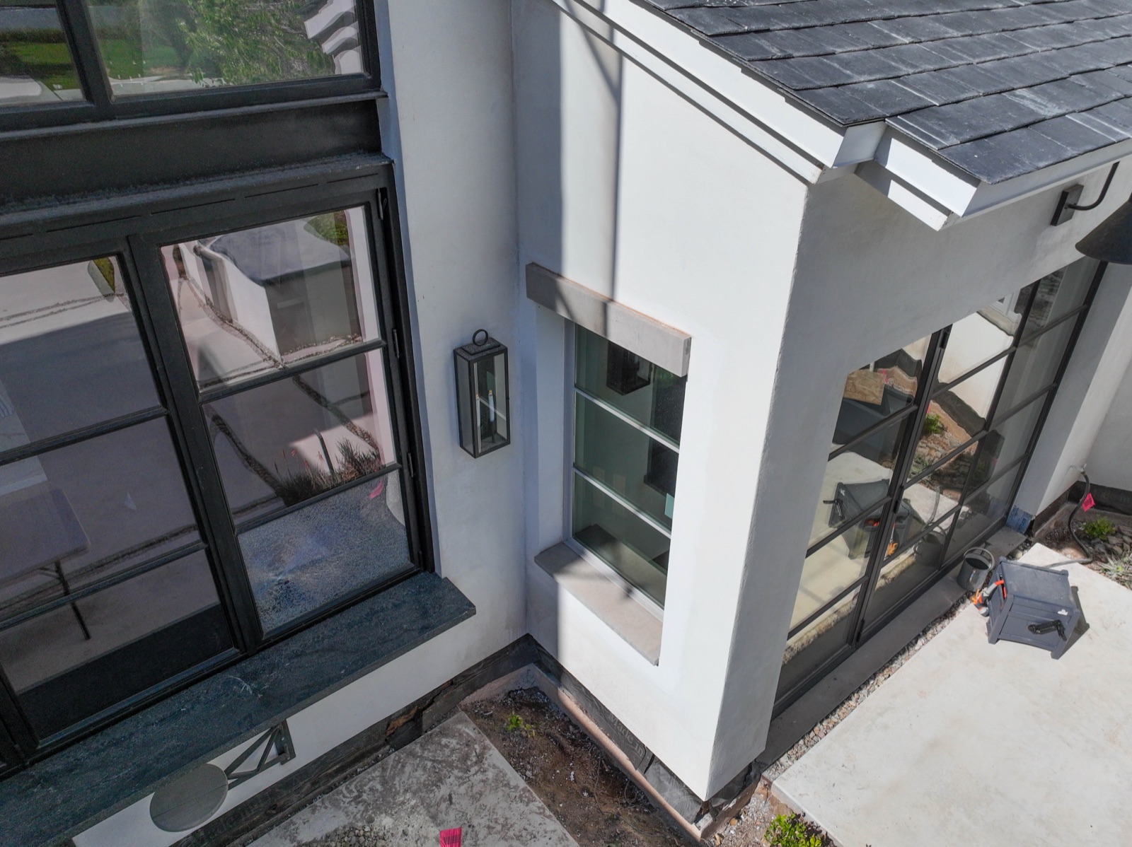 Aerial photo of a flat roof with satellite dish and mechanical equipment for thermal pairing