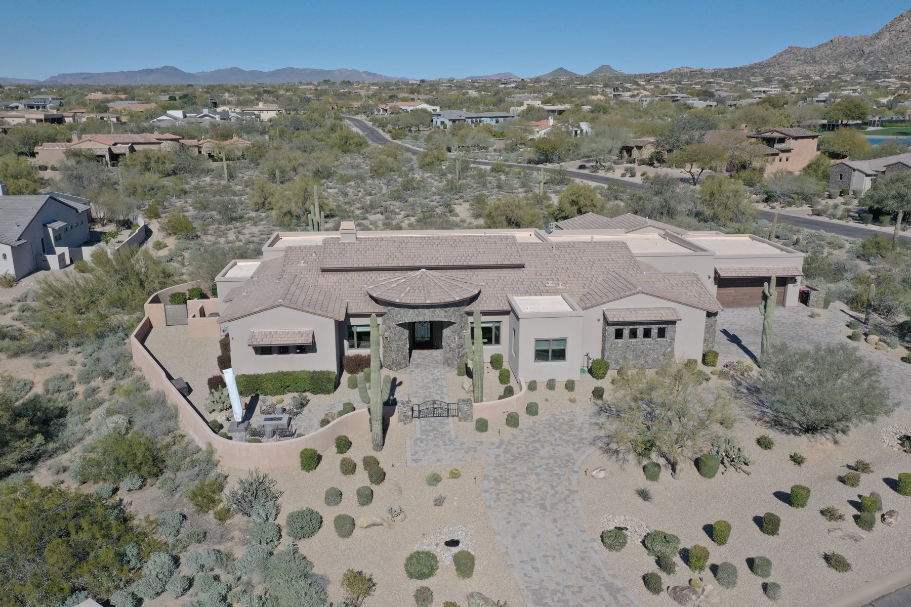 Aerial of a modern Cave Creek luxury estate with desert landscaping