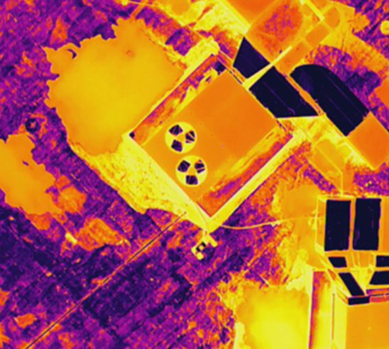 Radiometric thermal image of a rooftop solar array showing panel temperature variation