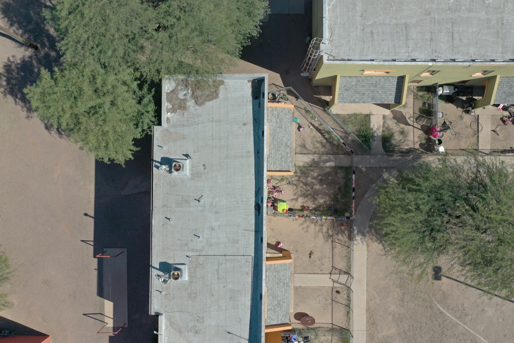 Aerial inspection of a commercial flat roof on East 28th Street in central Tucson