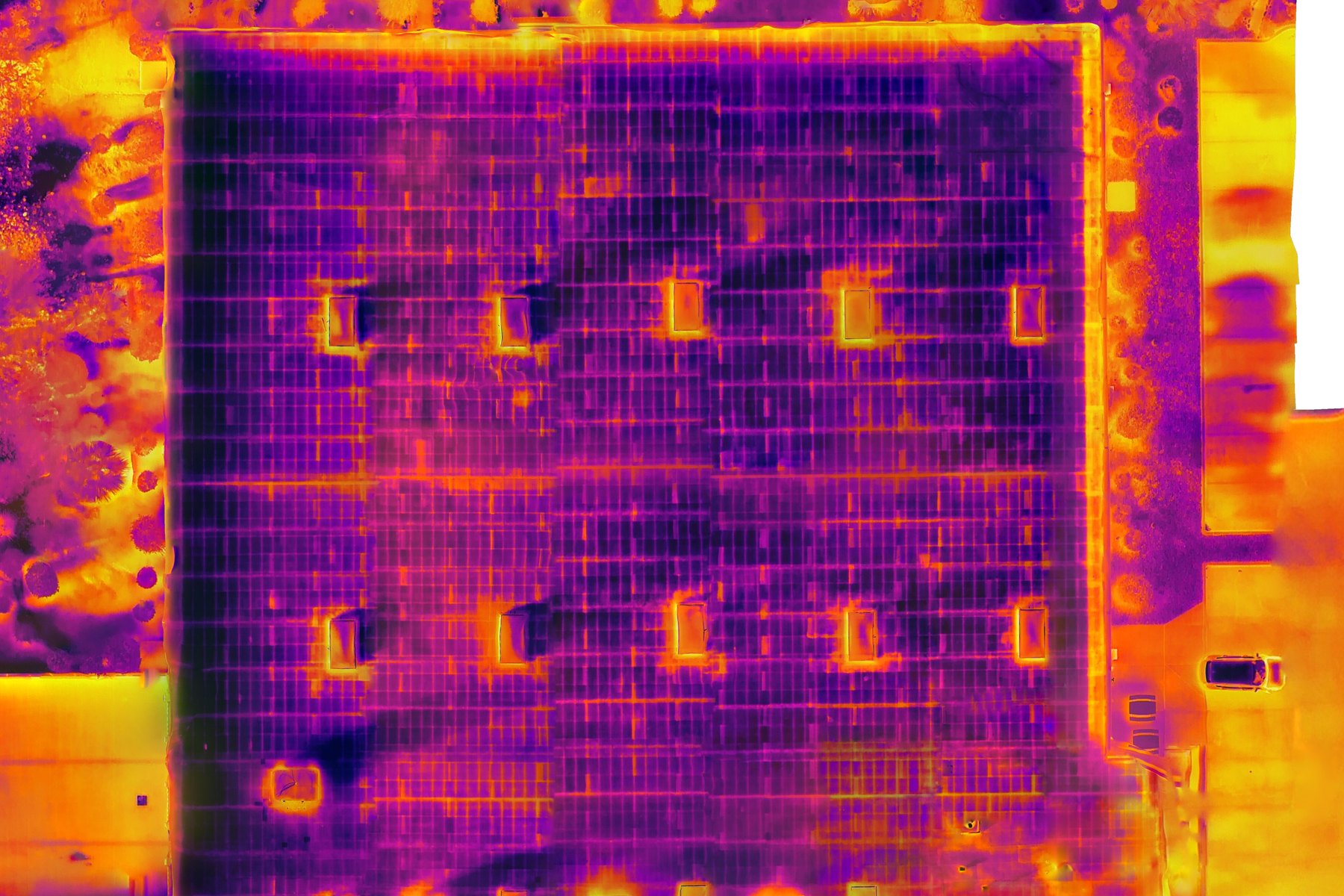 Radiometric thermal orthomosaic of a large commercial flat roof in west Phoenix, Arizona, showing moisture and heat anomalies